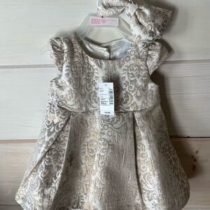 Elegant Cream and Gold Baby Dress & bow with soft head band included.